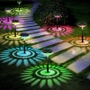 2x Lampa solarna ogrodowa rysuje koliste kolorowe pierścienie RGB 2x Lampa solarna ogrodowa rysuje koliste kolorowe pierścienie RGB